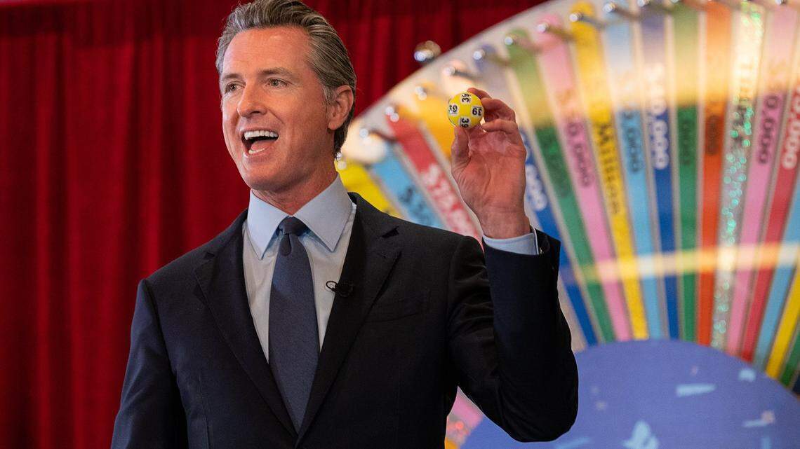 Governor Gavin Newsom holds a lottery ball at the California Lottery Headquarters on Friday, June 4, 2021, in Sacramento, while drawing numbers for California’s new $116.5 million Vax for the Win program – the largest vaccine incentive program in the nation.