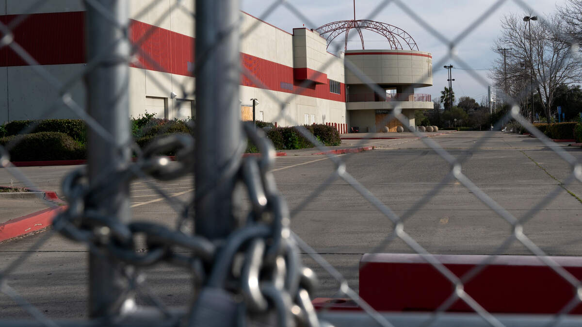 Fry’s Electronics has closed for good, shuttering all 31 of its locations, including its distinctive Sacramento store in North Natomas that is currently surrounded by a construction fence, Tuesday, March 2, 2021. California projects it will shed thousands of jobs in physical retail shops by 2028, including nearly 39,000 jobs in department stores.