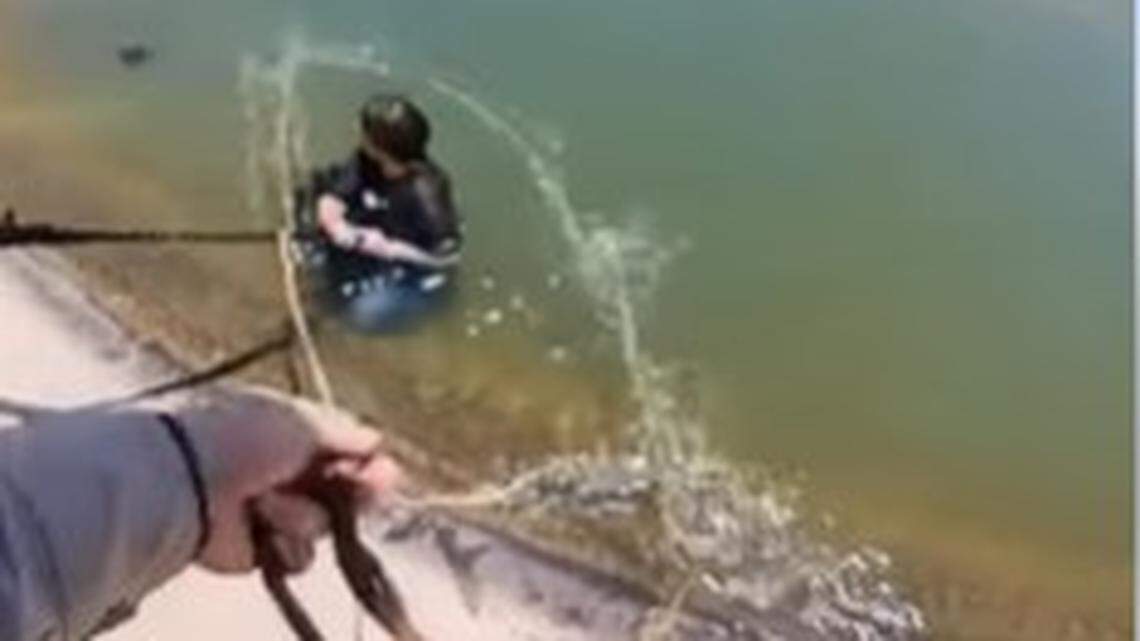 A woman who spent 18 hours in a “constant fight” for survival in a canal near Yuma was rescued after a train conductor spotted her, Arizona police say.