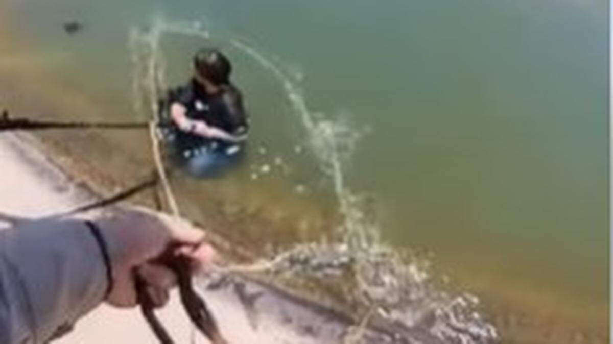 A woman who spent 18 hours in a “constant fight” for survival in a canal near Yuma was rescued after a train conductor spotted her, Arizona police say.