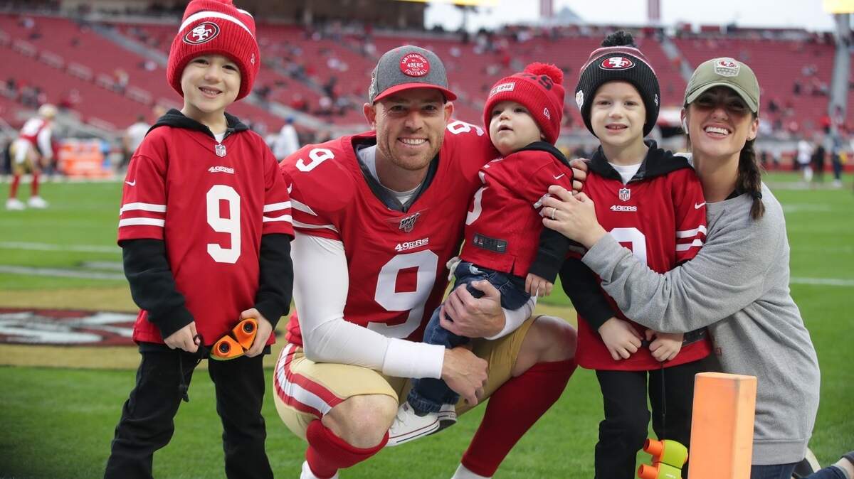 San Francisco kicker Robbie Gould poses with sons Gavin, left, Grayson and Gavin. He and his wife Lauren, right, are on full-time parenting duty during the coronavirus pandemic.