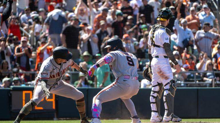 Giants slug past A’s in gusty series finale behind Harrison Bader’s grand slam