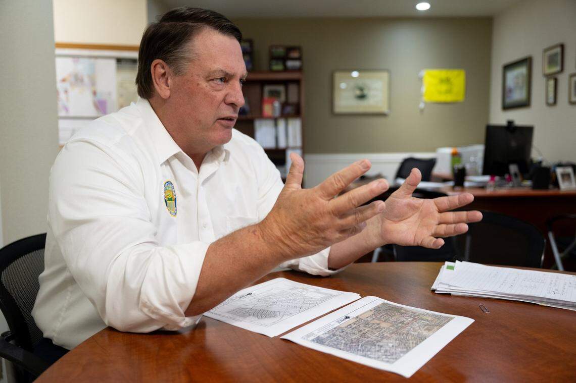 Williams city administrator Frank Kennedy explains Tuesday the need of new water pipes over a map of with leaking and corroded pipelines.