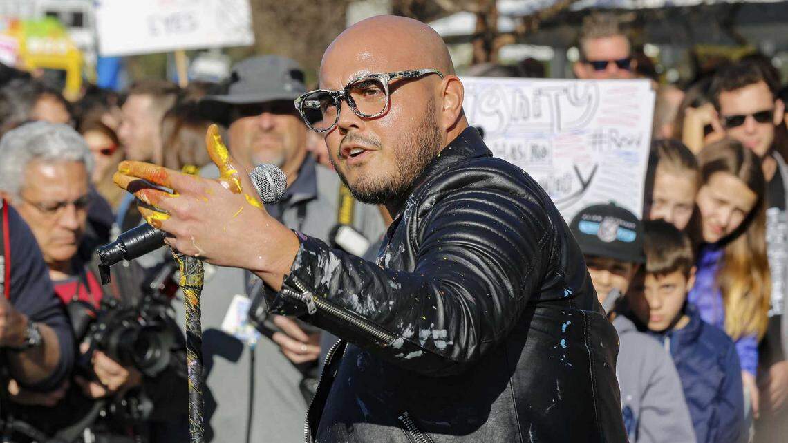 Artist David Garibaldi speaks at a rally in Beverly Hills in 2017. The Sacramento-based painter served five days in jail for violating the terms of his divorce, according to court records.