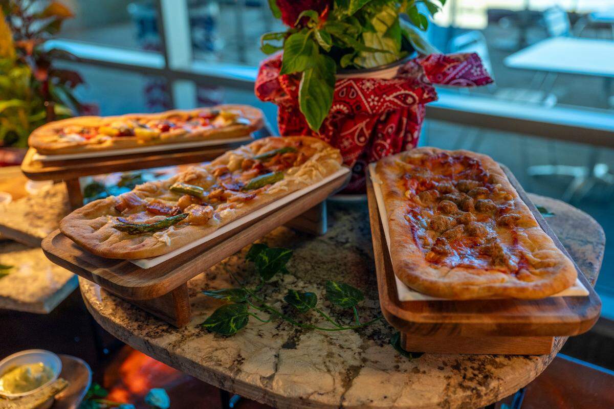 Flatbread pizzas sit on display during the California State Fair preview in Sacramento on Wednesday, July 9, 2025.