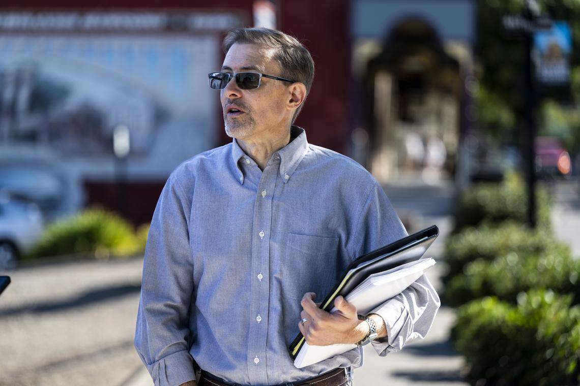 Desmond Parrington, a planning manager for the city of Folsom, walks the downtown historic district of his city on Friday. He's worried that the transit-oriented housing requirements of Senate Bill 79 could upend plans his city has made to add contextually appropriate levels of housing to the area.  