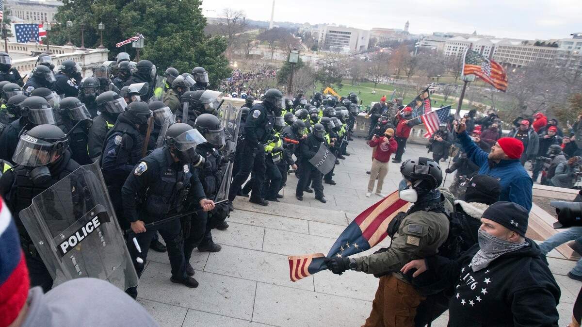 U.S. Capitol Police push back demonstrators who were trying to enter the U.S. Capitol on Wednesday, Jan. 6, 2021, in Washington. (AP Photo/Jose Luis Magana)