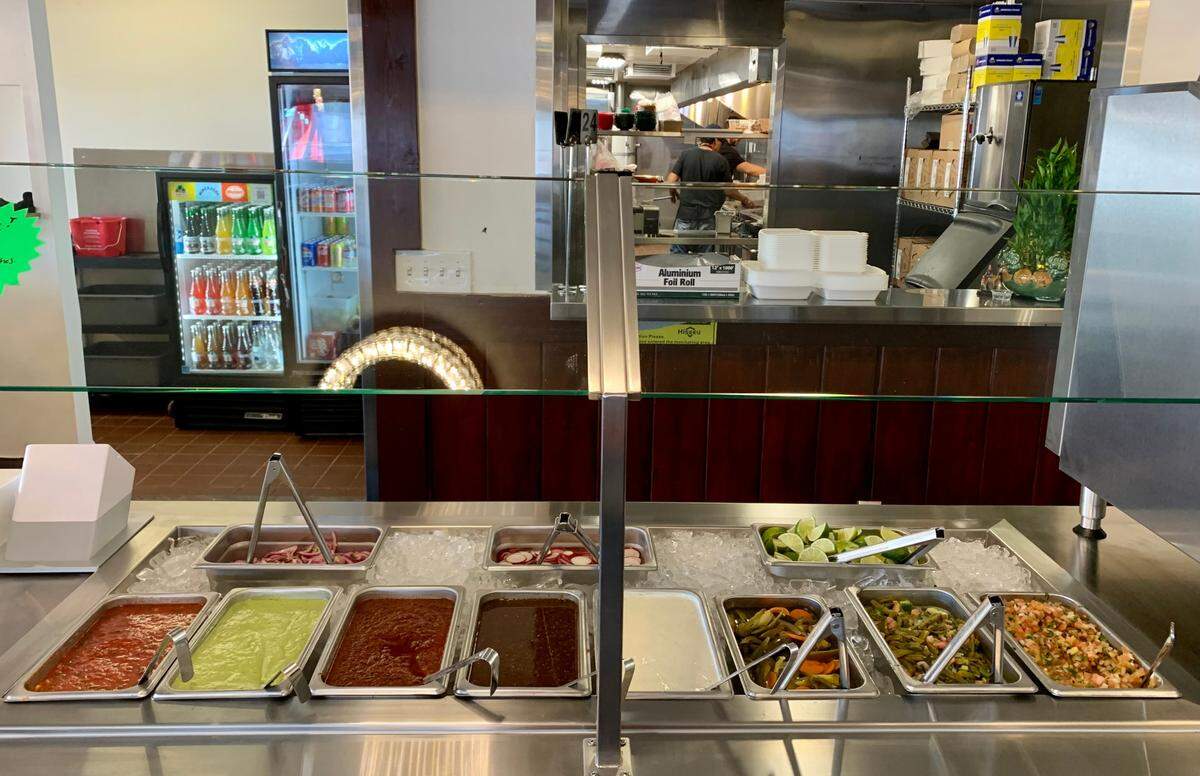 Los Inmortales Taqueria Cocina Mexicana opens a fourth location in the Sacramento area on Sept. 25, 2023, at 501 Broadway in Upper Land Park. Inside; there’s a coffee, juice and condiment bars.