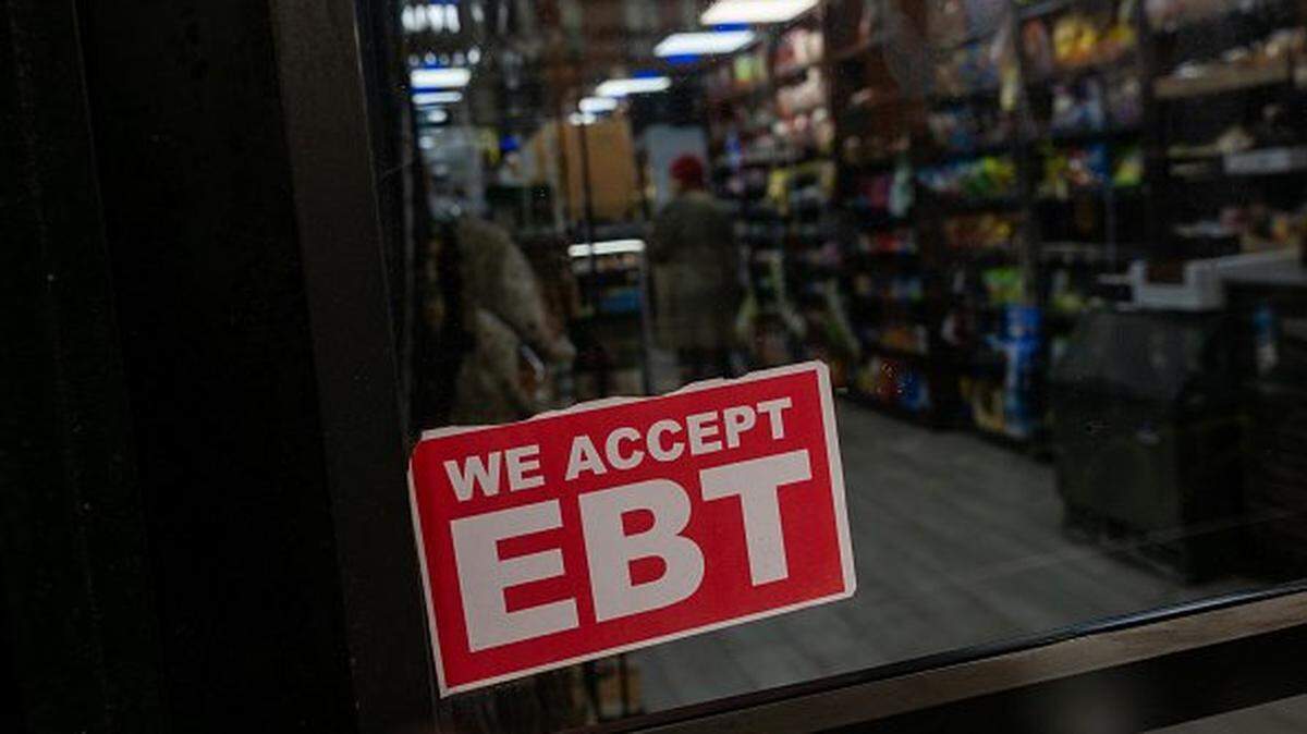 NEW YORK, NY - OCTOBER 30: A store displays a sign accepting Electronic Benefits Transfer (EBT) cards for Supplemental Nutrition Assistance Program (SNAP) purchases for groceries on October 30, 2025 in New York City. Approximately 42 million Americans rely on food stamps that are deposited monthly onto their EBT cards. On November 1st, that assistance is set to end amid the ongoing U.S. government shutdown, potentially leaving households desperate to find ways to put food on the table. (Photo by Spencer Platt/Getty Images)