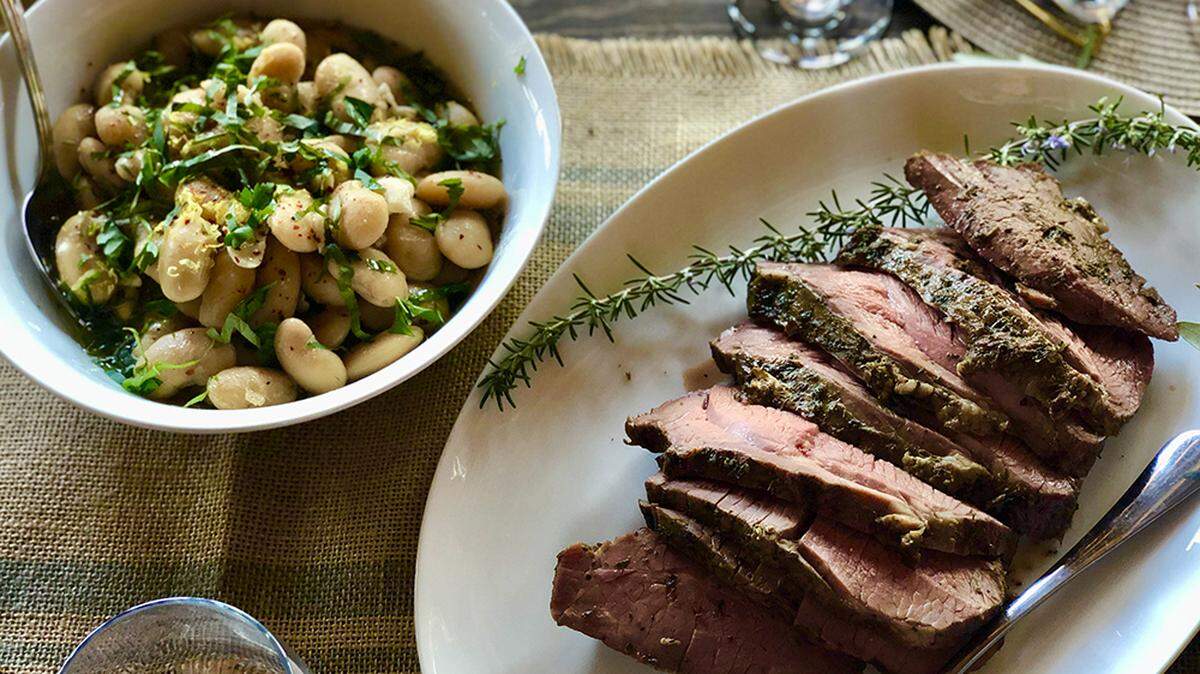 Lamb and summer white beans are two of the entrees every year at the Village Feast.