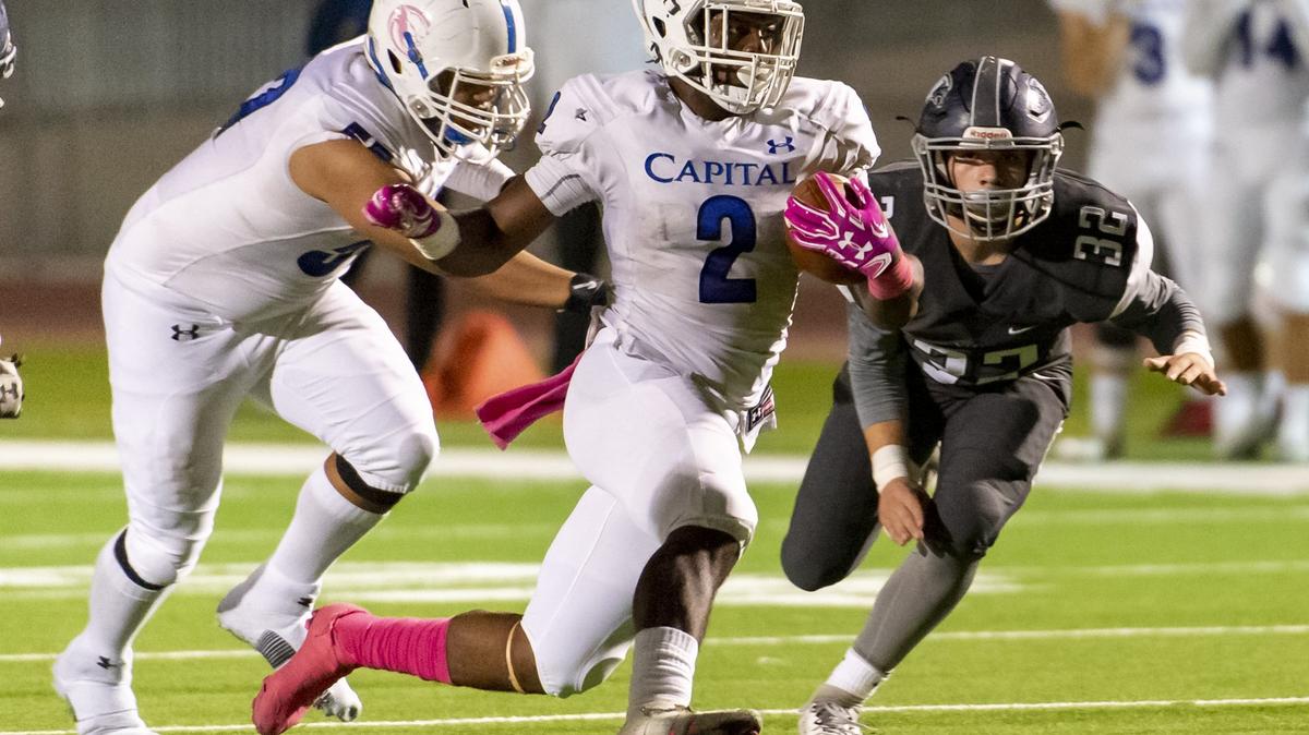 Capital Christian Cougars D’Marcus Ross (2), runs with the ball as the Vista del Lago Football Eagles host the Capital Christian Cougars, Friday Oct 26, 2018.  
