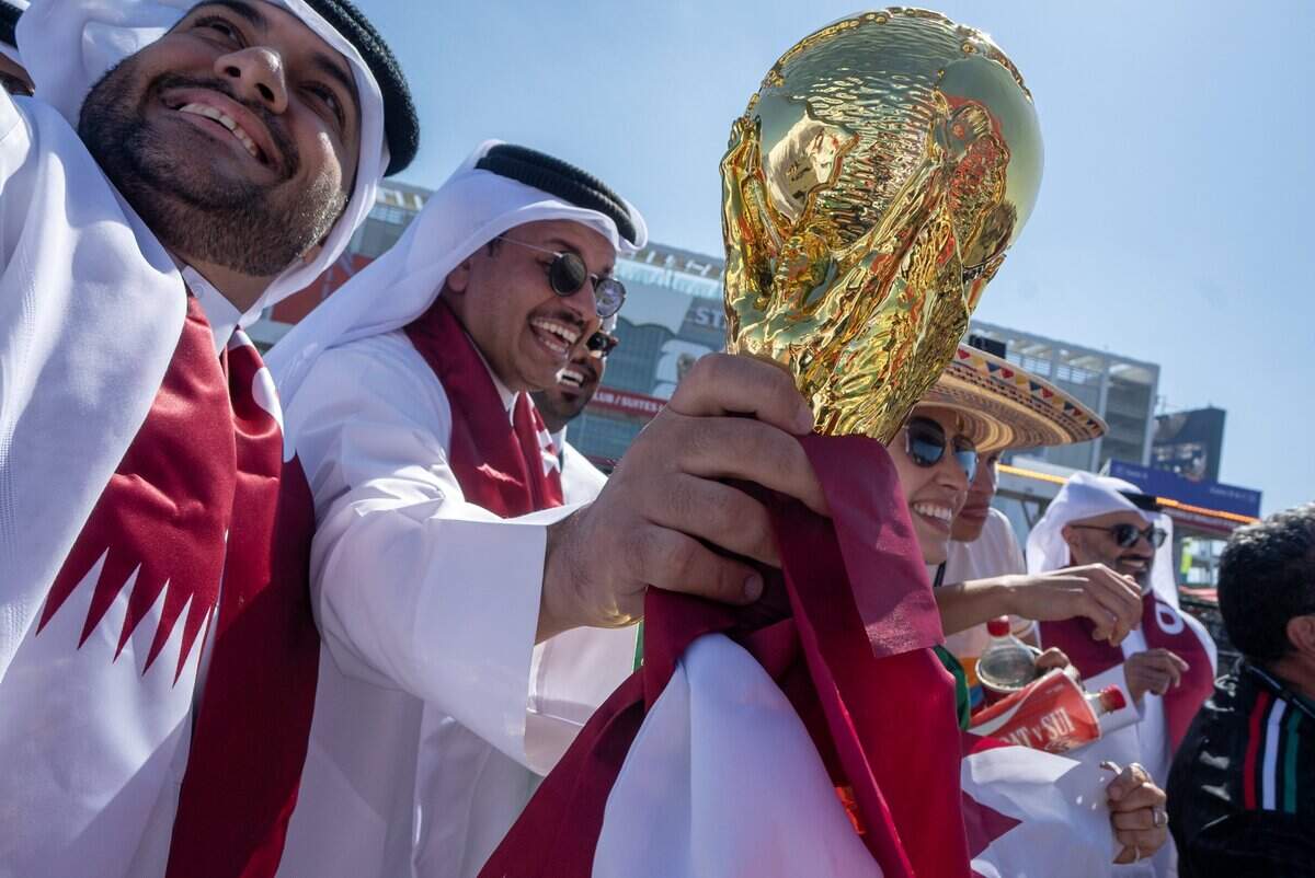 Qatar supporters celebrate before kickoff against Switzerland at the World Cup group stage game in Santa Clara on Saturday.