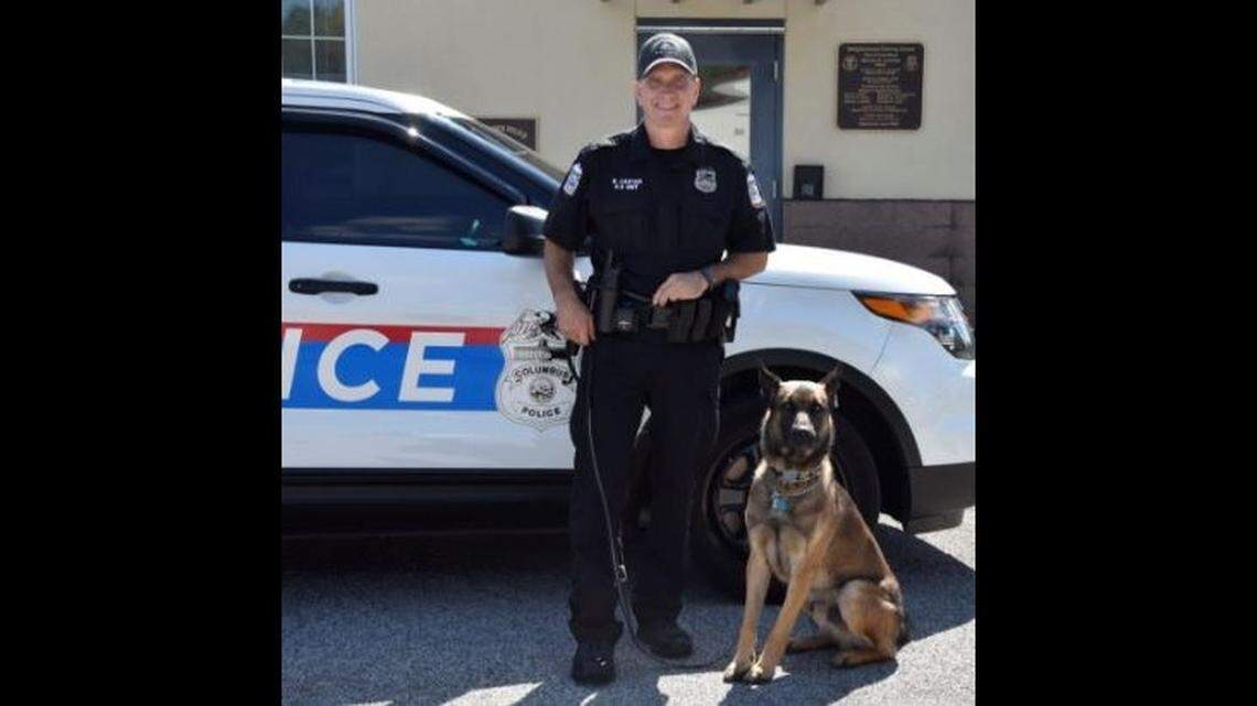 Officer Brian Carter of the Columbus, Ohio, police division shot Benzi, his K9 partner, Saturday after the Belgian Malinois attacked him during a training session, police say. Benzi was later euthanized.