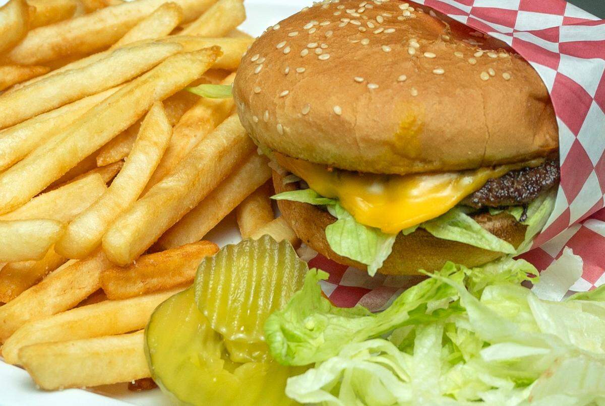 Jointed Cue Billiards, a pool hall in Hollywood Park,. has reasonably-priced meals and a “must-try” cheeseburger.