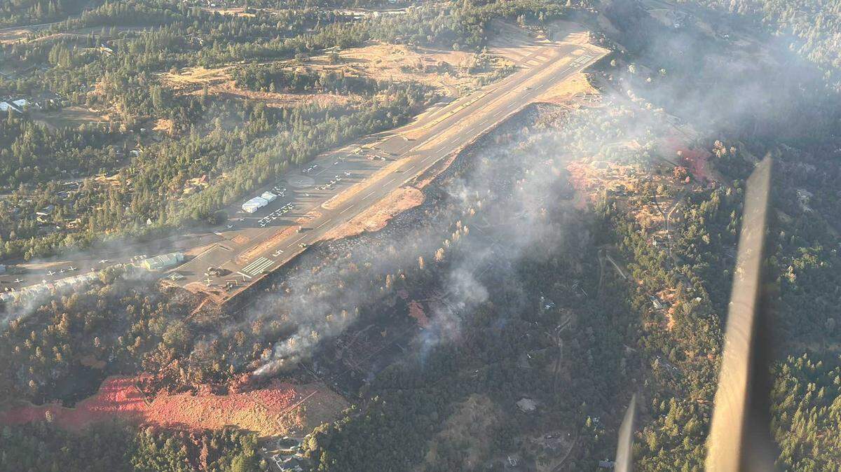 Retardant and dozer lines are seen around Placerville Airport on Saturday, July 7, 2024, as crews worked to control the Pay Fire. On Sunday, firefighters said the fire’s forward progress had been stopped after it chewed through 77 acres in El Dorado County.