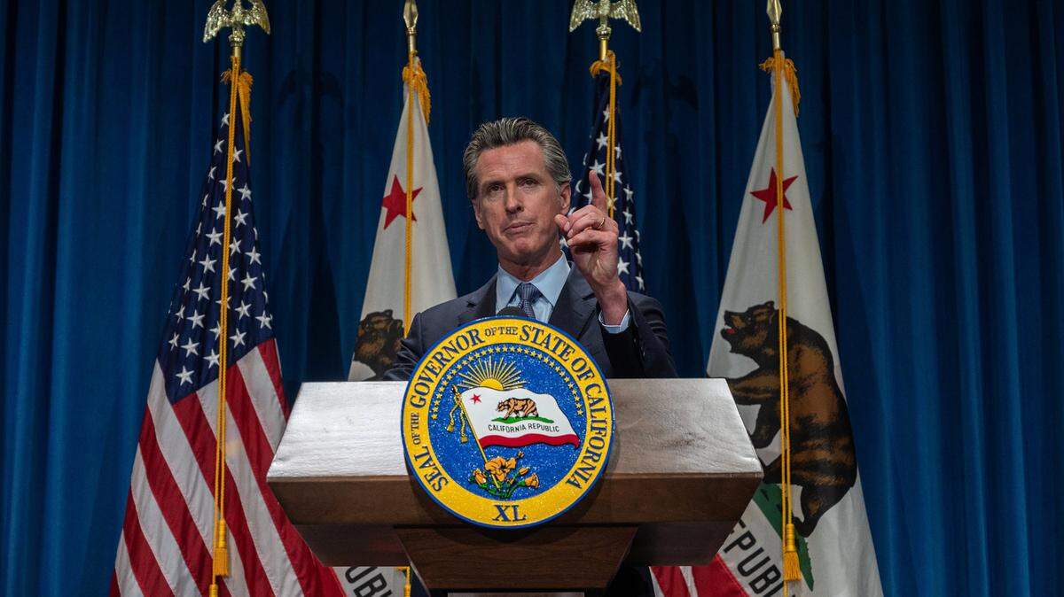California Gov. Gavin Newsom answers questions from reporters after delivering his revised May budget proposal at a press conference on Friday, May 14, 2021 in Sacramento.