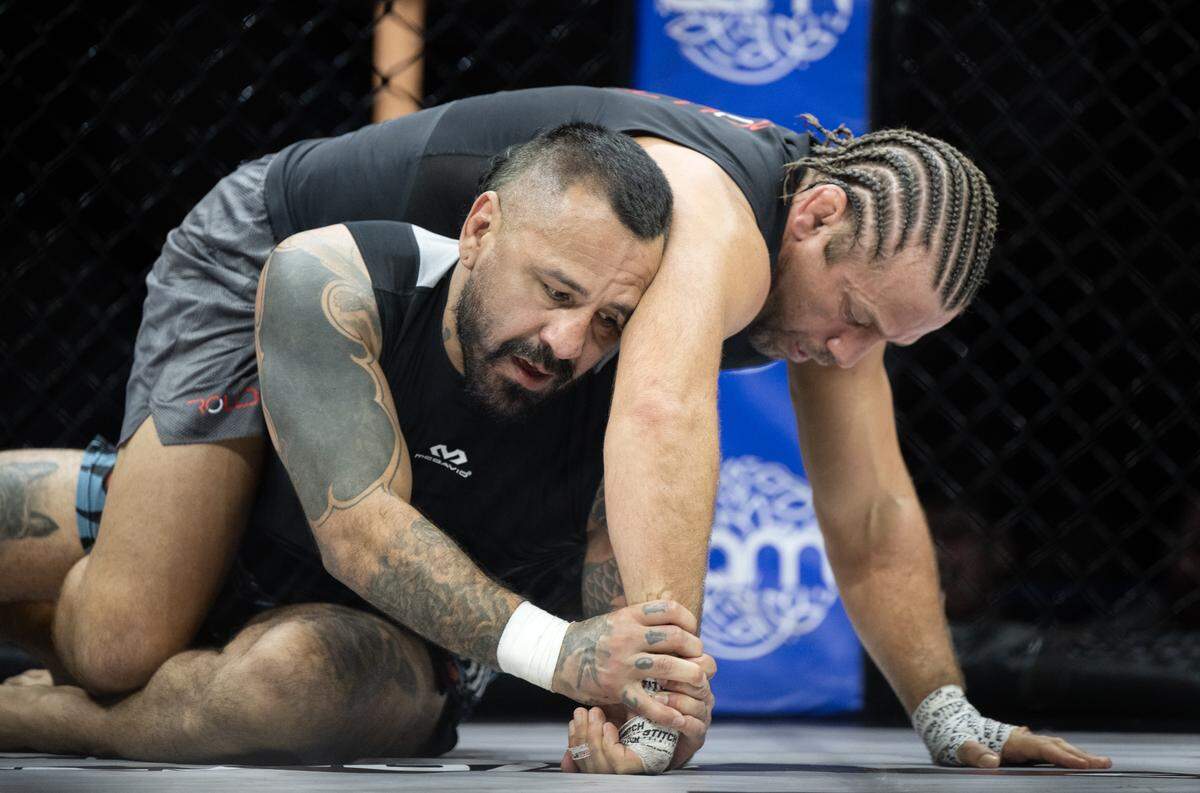 Francisco Rivera Jr. attempts to secure Urijah Faber's wrist during the main event of the lightweight Combat Jiu-Jitsu competition at the Hard Rock Hotel & Casino Sacramento at Fire Mountain near Wheatland on Friday, Jan. 30, 2026.