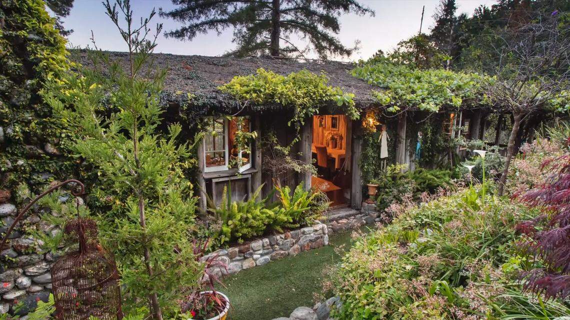 A 90-year-old log cabin in Big Sur built by settler Sam Trotter is for sale at $2.8 million. The 2,400-square-foot home built in 1930 has three bedrooms and 2.5 baths and sits on just over two acres of land with ocean views.