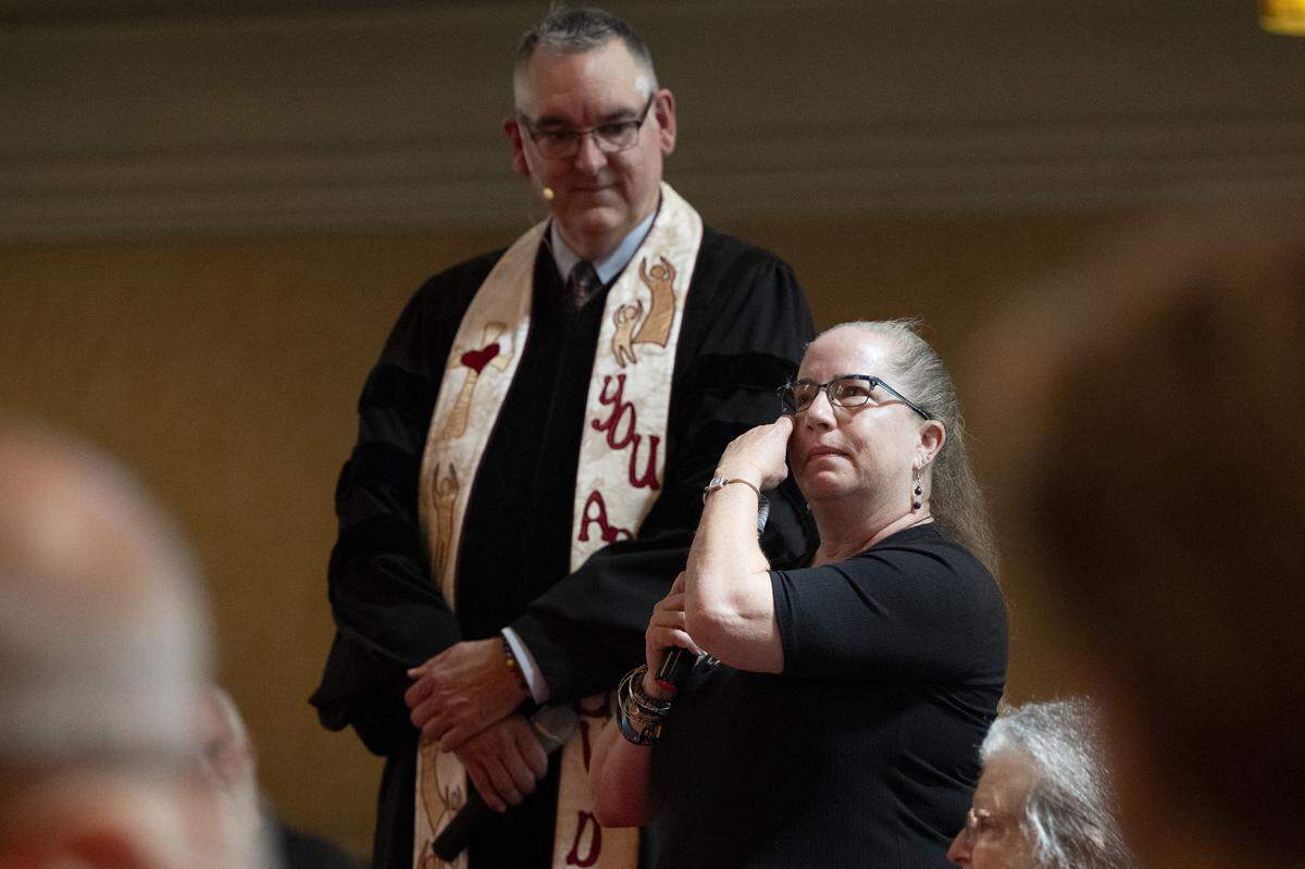 Fay Grundel tears up as she shares memories of the church during the final service of Pioneer Congregational United Church of Christ at their church on L Street in Sacramento on Sunday, May 31, 2026.