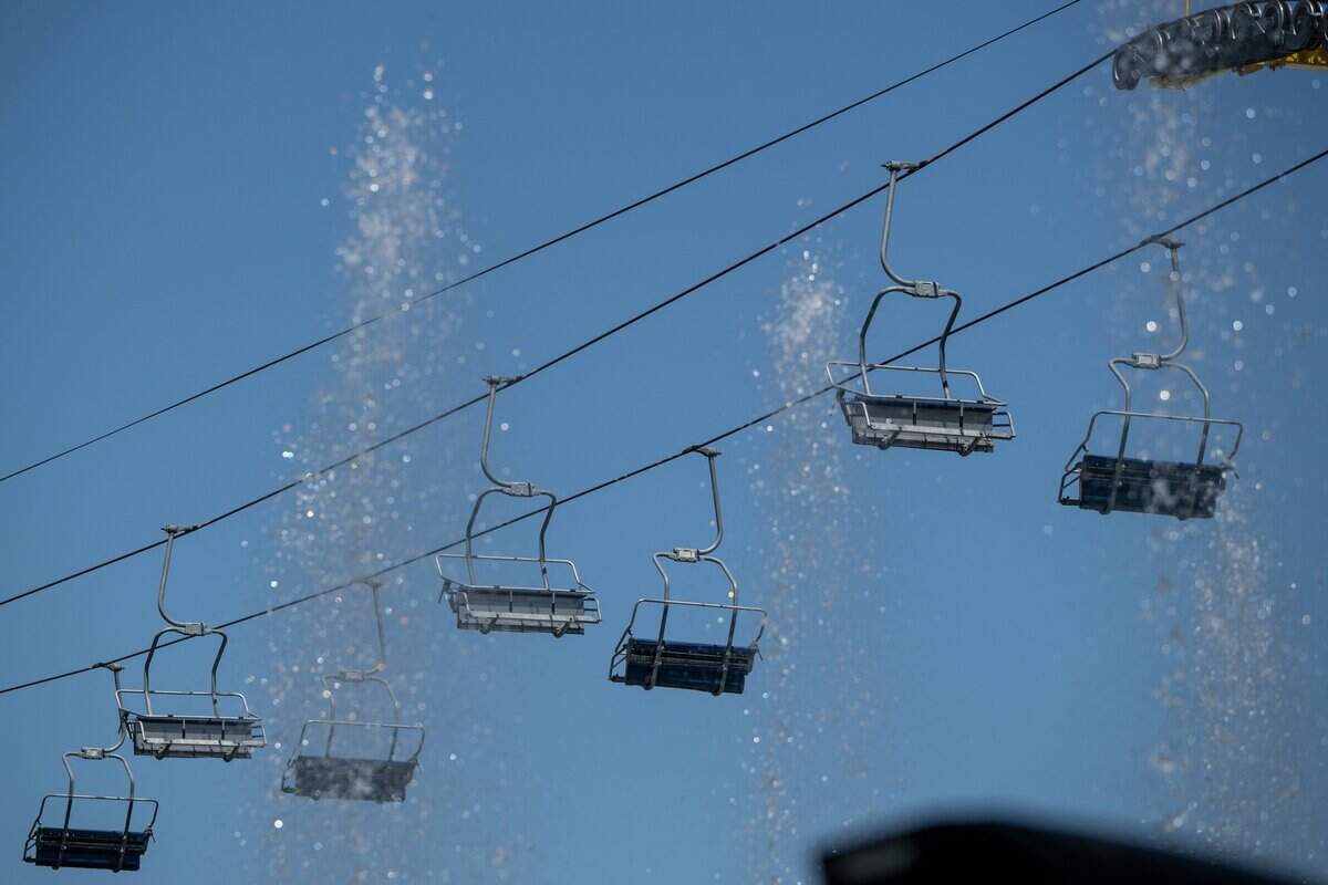 With the Sky Ride in the background, a fountain shoots up in front of that chair lift at Cal Expo in Sacramento during the California State Fair media day on Wednesday, July 15, 2026.