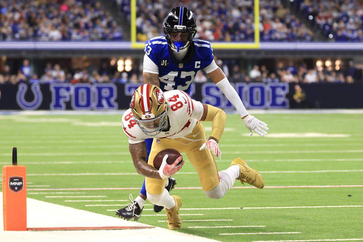 INDIANAPOLIS, INDIANA - DECEMBER 22: Kendrick Bourne #84 of the San Francisco 49ers dives for the first down during the second quarter of the game against Cameron Mitchell #43 of the Indianapolis Colts at Lucas Oil Stadium on December 22, 2025 in Indianapolis, Indiana. (Photo by Justin Casterline/Getty Images)