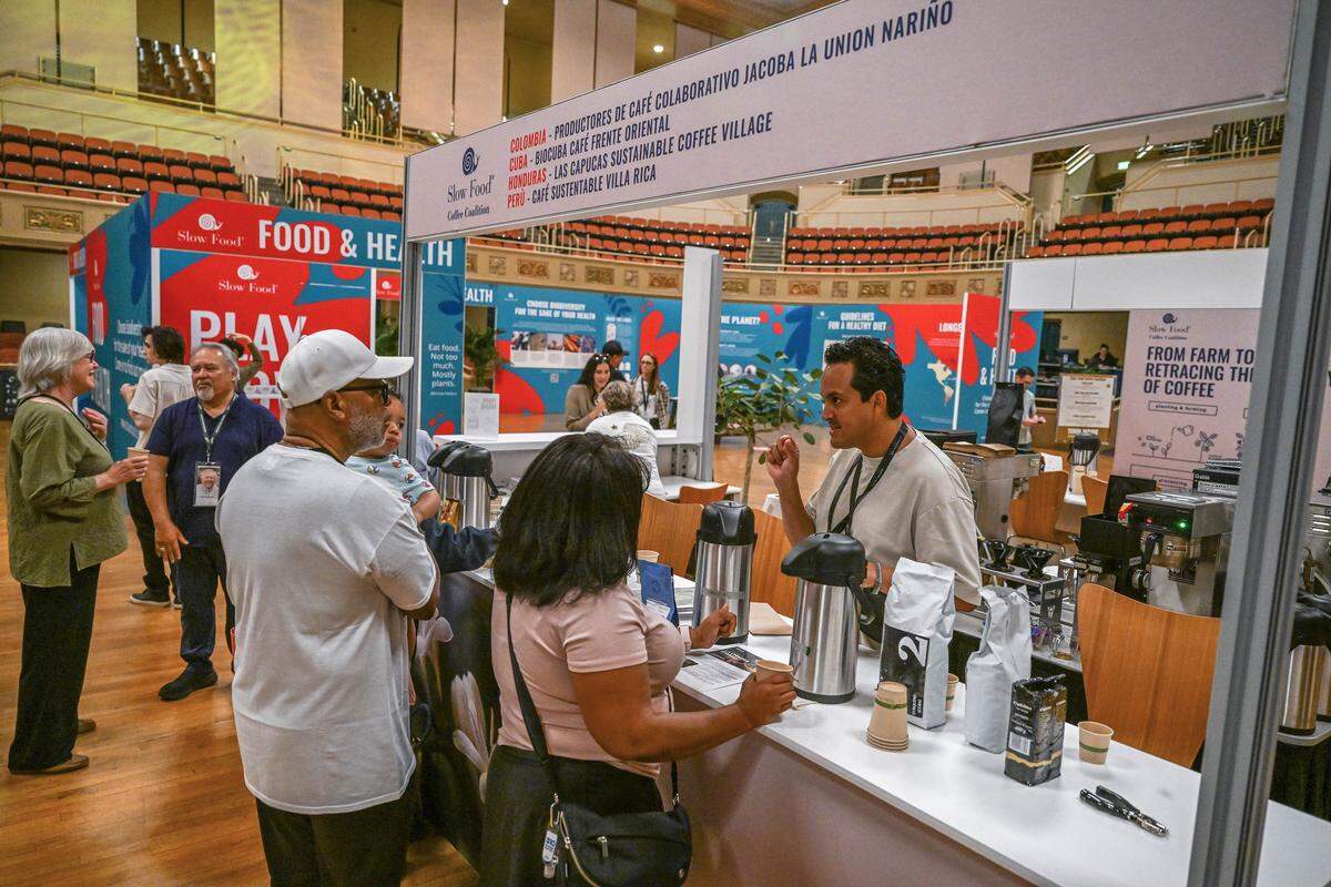 Barista Cesar Marin of Peru offers coffee during a tasting at an inaugural Terra Madre Americas event sponsored by Slow Food at the Sacramento Memorial Auditorium in 2024. 