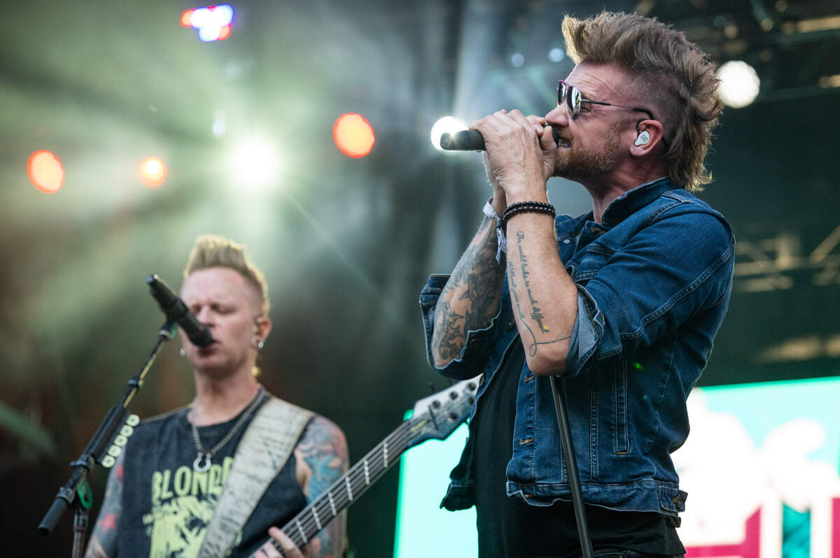 Hinder lead singer Marshal Dutton performs with bassist Mike Rodden during the Aftershock festival on Sunday, Oct. 5, 2025, in Sacramento’s Discovery Park.
