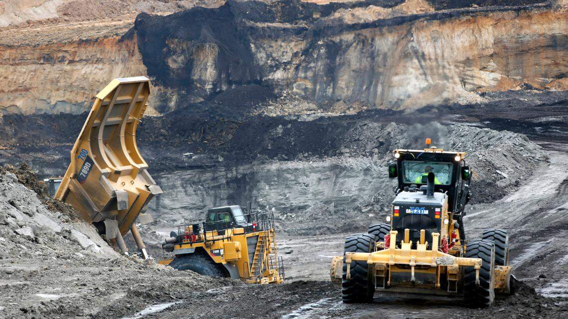 Heavy machinery moves through the open lignite pit at Liberty Mine adjacent to the Mississippi Power Co. carbon capture power plant near DeKalb, Miss.