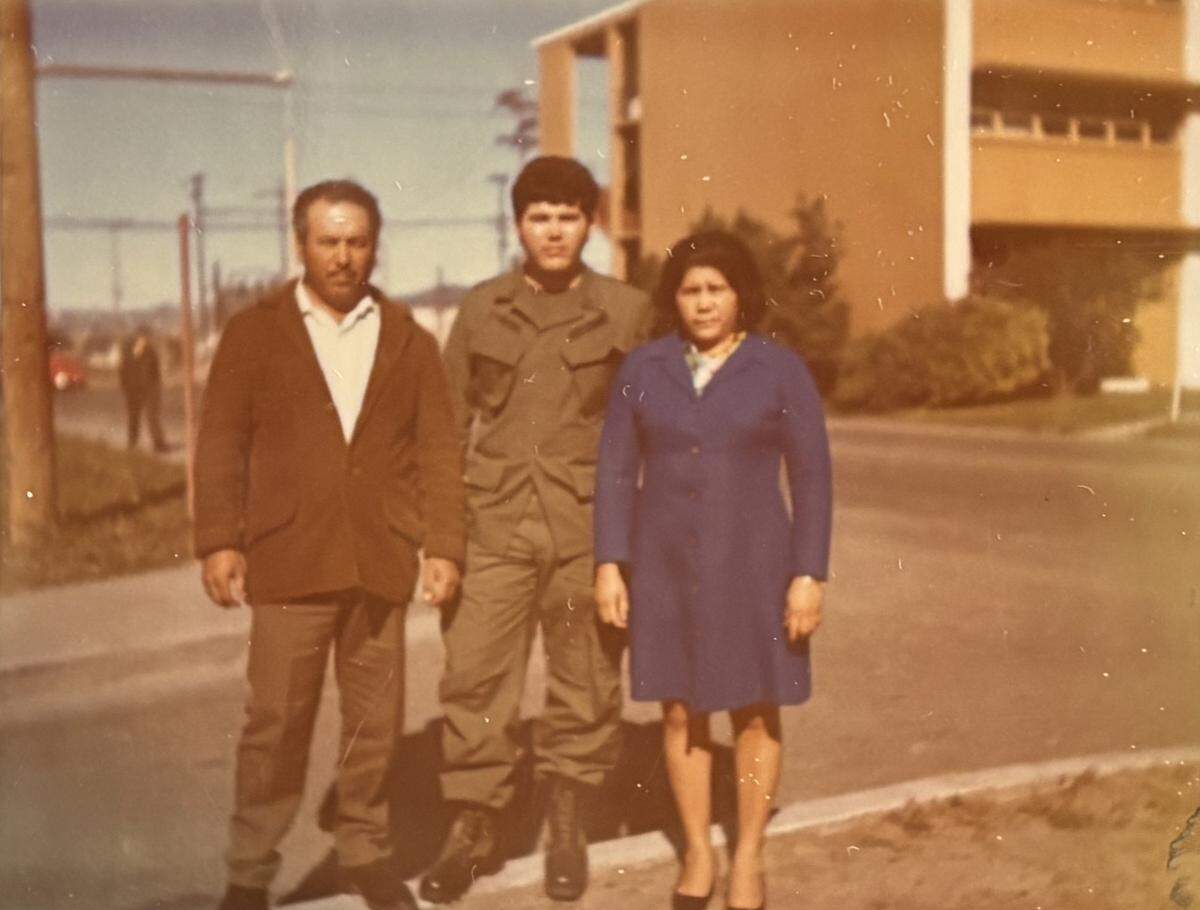 Santos Jimenez with son George Jimenez and wife Felicitas Jimenez appears in the early 1970 prior to George’s deployment to Vietnam.