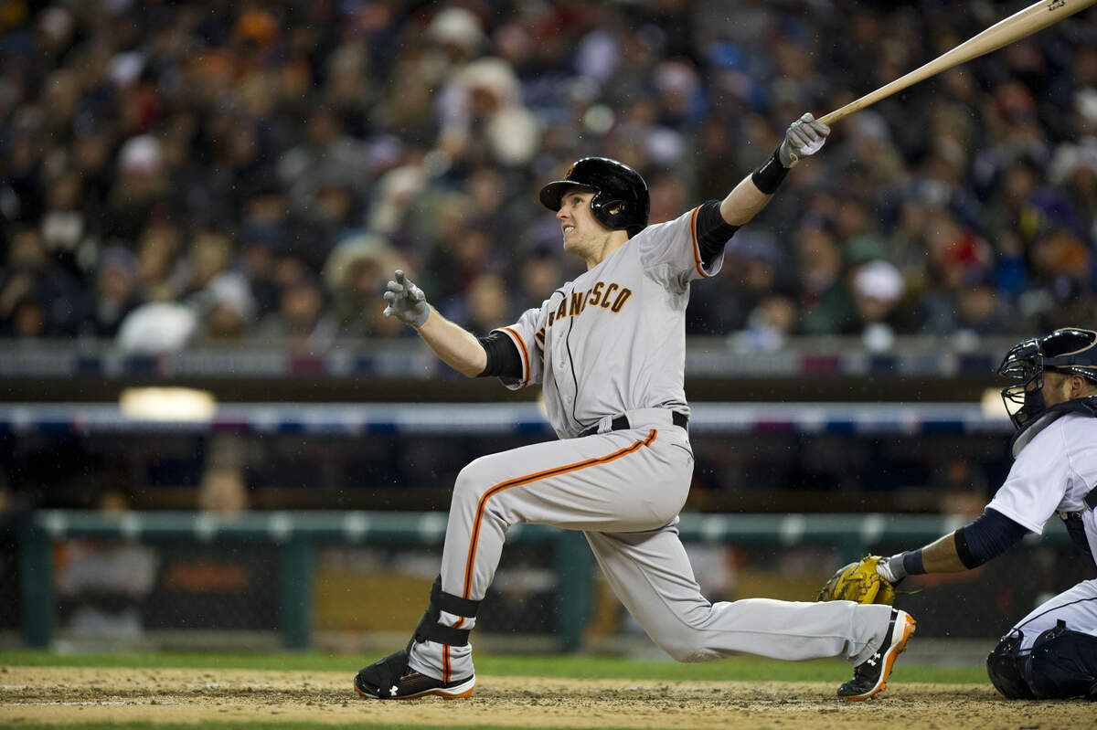 San Francisco Giants catcher Buster Posey (28) hits a two run homer in the sixth inning during game 4 of the World Series between the San Francisco Giants and the Detroit Tigers on Sunday October 28, 2012 at Comerica Park in Detroit, Michigan.