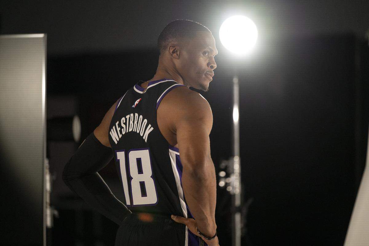 Russell Westbrook poses for a video shoot after a press conference introducing him as a Sacramento Kings player in Sacramento on Sunday.