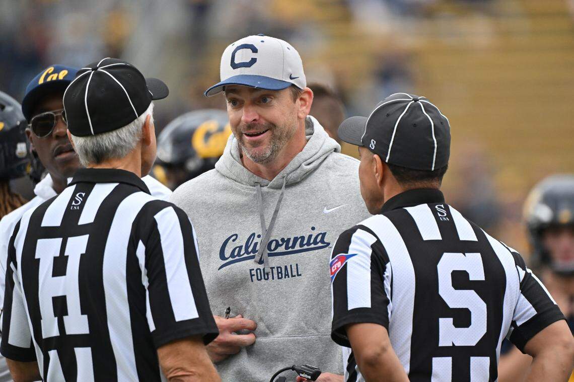 California Golden Bears football coach Justin Wilcox talks with a referee during the game against the Arizona State Sun Devils at California Memorial Stadium in 2023.
