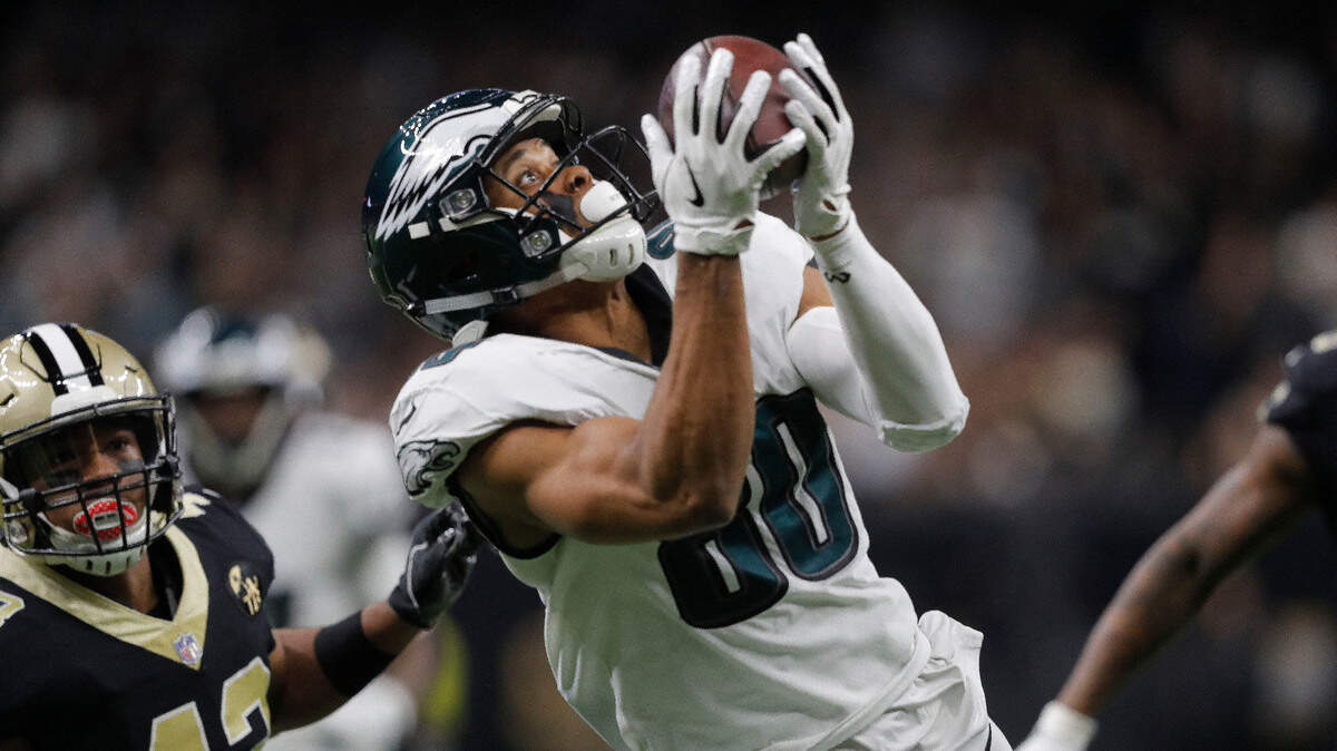 Wide receiver Jordan Matthews (80) of the Philadelphia Eagles turns this catch into a touchdown against the New Orleans Saints in an NFL divisional playoff game on Jan. 13 in New Orleans. Matthews joined the San Francisco 49ers on March 14. (AP Photo/Gerald Herbert)