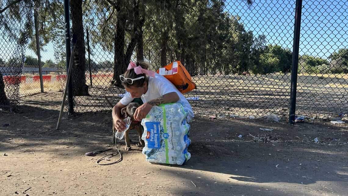 Homeless people stock up on water. Why does Sacramento trash their supply?