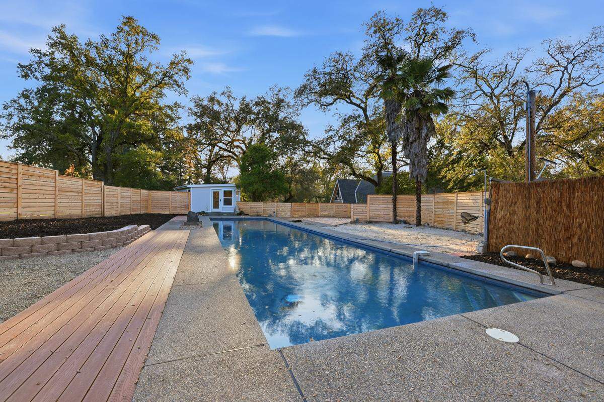 Serenity and unique character are the central themes of the property, which features mature trees and landscaping, a seasonal pond, lap pool and endless potential. Granite Bay is a suburb northeast of Sacramento.