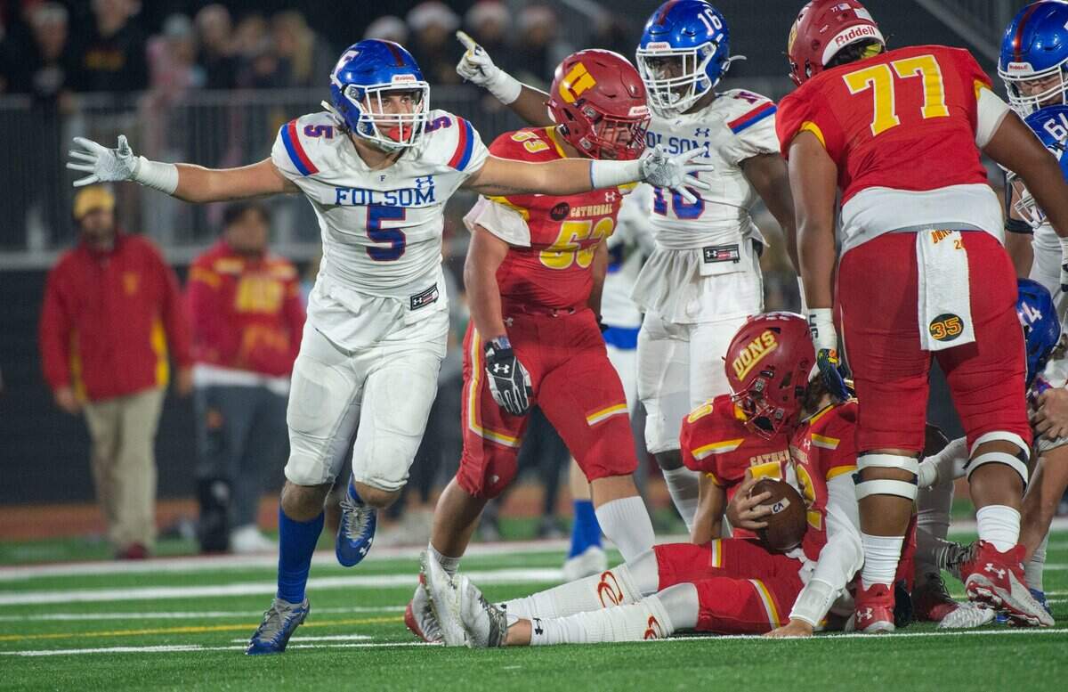 Folsom’s Justin Eklund celebrates a sack during the CIF State Division 1-AA Championship in Mission Viejo on Friday, Dec. 10, 2021.