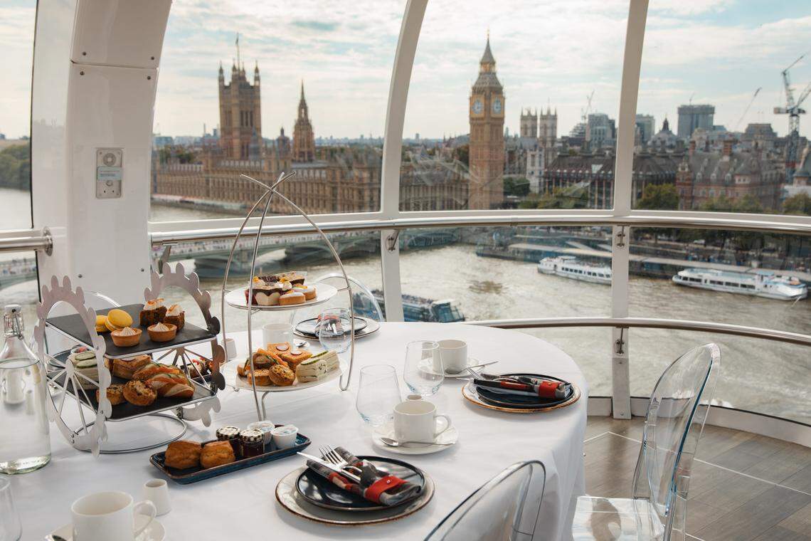 Festive Afternoon Tea aboard the London Eye with sweeping views of Parliament and the Thames.