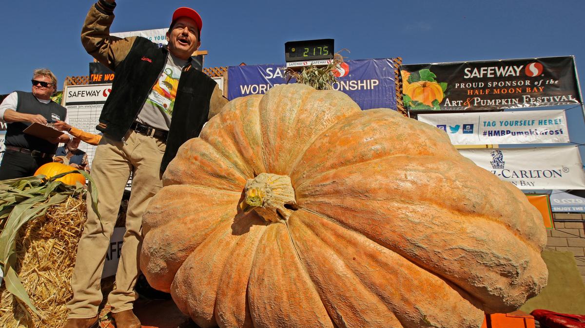 Leonardo Urena of Napa reacts after learning his pumpkin weighed in at 2,175 pounds, a new California weight record on Oct. 14 in Half Moon Bay.