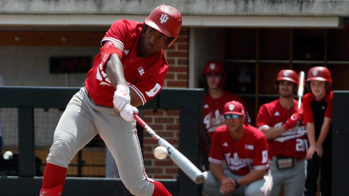 Indiana Hoosiers infielder Devin Taylor (5) swings at the ball during a game against Purdue in 2024 in West Lafayette, Ind. The Athletics selected Taylor with the 48th overall pick in the second round of the 2025 MLB draft.