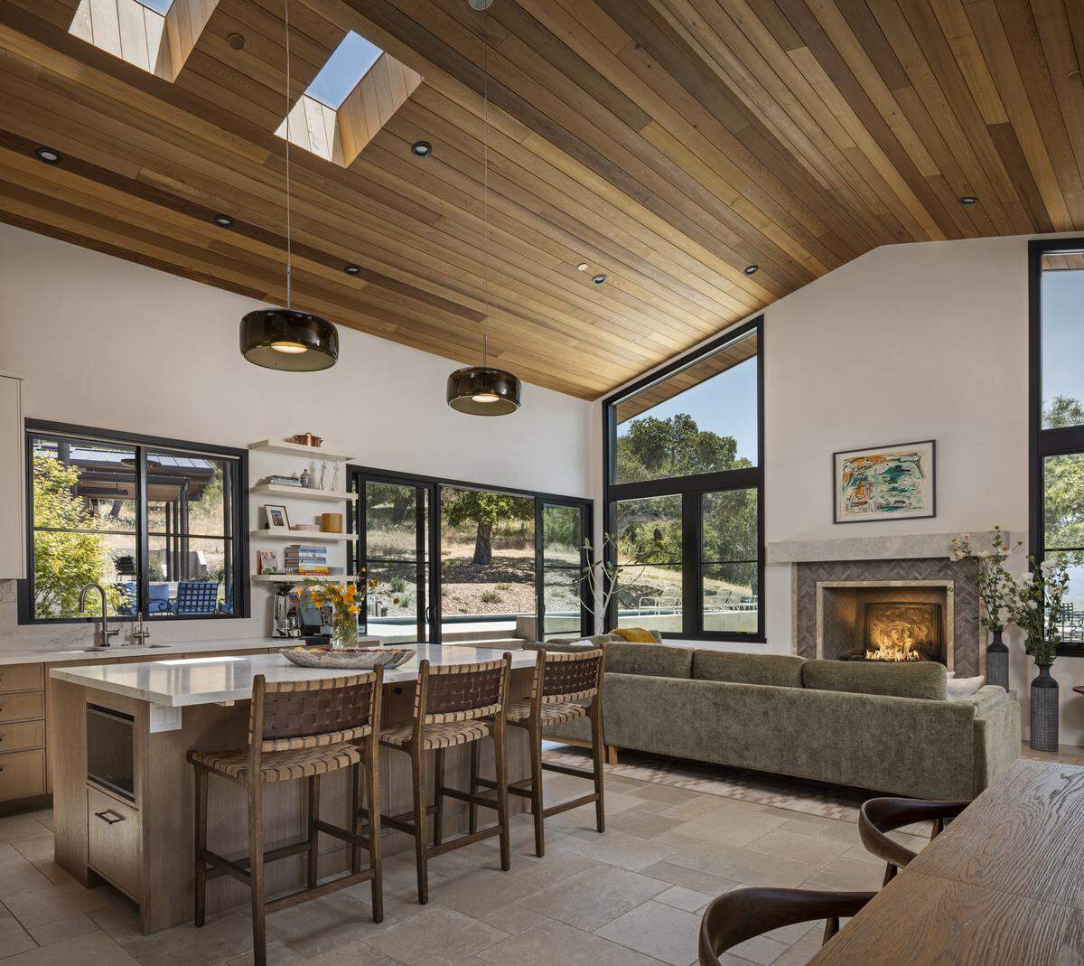 At roughly 4,925 square feet of living space, seven bedrooms spread across the main house.