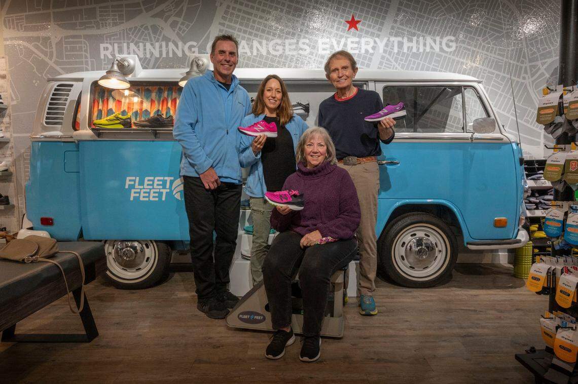 Randy and Beth Seevers, who started the foundation Runnin’ for Rhett in honor of their son Rhett who passed away from complications of cerebral palsy, stand with Patricia and James Drake, who donated $20,000 through The Bee’s Book of Dreams to purchase running shoes for youth in their fitness programs at Fleet Feet in Sacramento on Wednesday, Jan. 5, 2022. Fleet Feet partners with Runnin’ for Rhett to buy the kids shoes from New Balance at below cost.