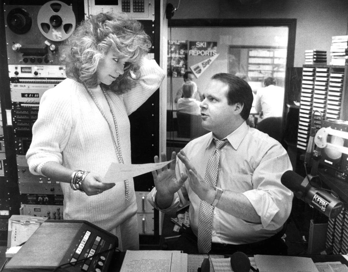 KFBK morning show host Rush Limbaugh, 35, talks with producer Kitty O’Neal, who screens calls for the show, in August 1986. “Sacramento is a feeder market,” he told The Bee at the time. “It is not my final resting place. Everything I’m doing is designed to hold on. Someday, I’d love to be in Washington, D.C.