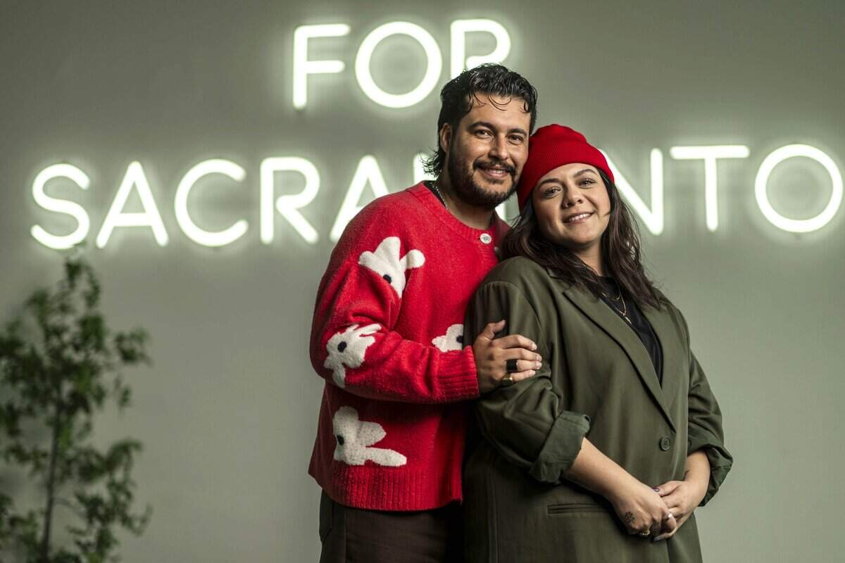 Pastor Antonio Reyes and his wife Gabby stand together at Project Church in south Sacramento on Wednesday. Gabby said she screamed and fell to the floor after reading the non-disclosure agreement and realizing that Antonio would be part of Bad Bunny's Super Bowl halftime show.