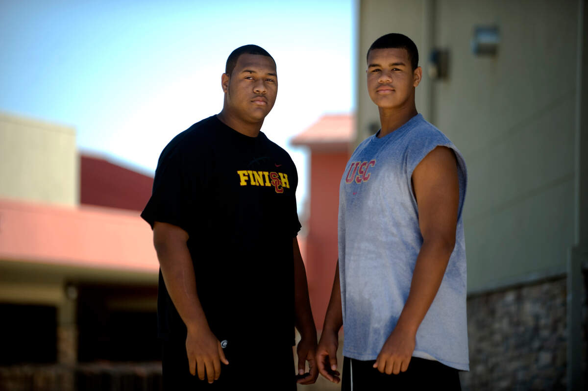 Armond Armstead, left, and Arik Armstead, right, pose at Pleasant Grove High School in August 2009 while in high school. Armond says he supports his brother, who will play for the 49ers in Super Bowl LVIII on Sunday.