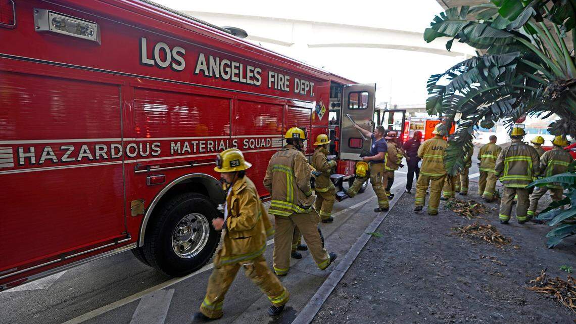 Four workers were sickened, including one critically, by a release of carbon dioxide early Monday in a Los Angeles International Airport utility room, authorities said.