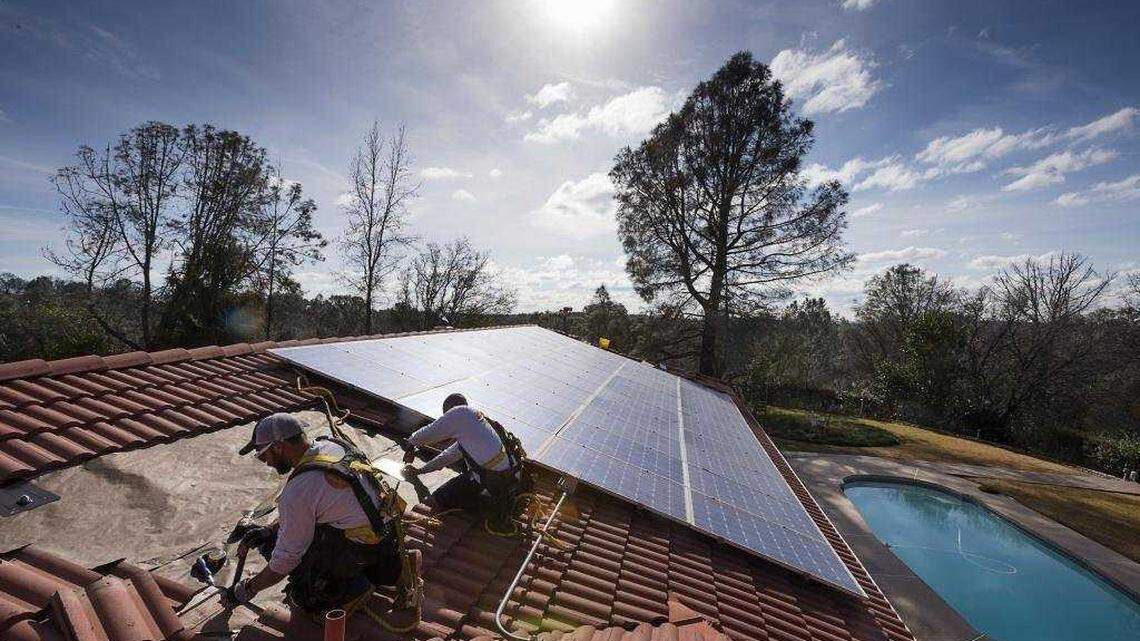 Brackets for rooftop solar are installed on a roof in Loomis in 2018. The California Chamber of Commerce has concluded that the state’s solar rooftop program is the most costly regulation for electricity ratepayers in the state.