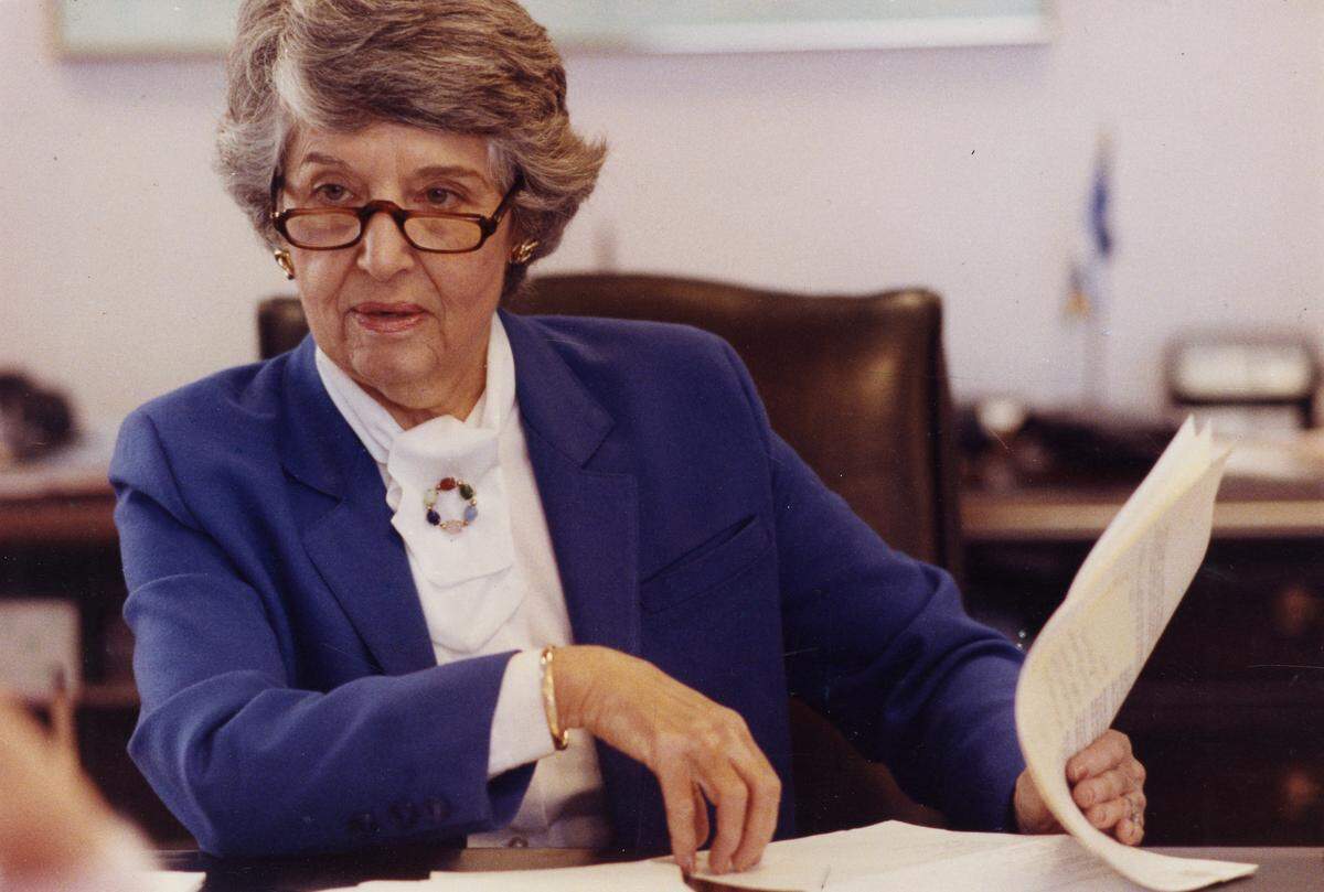 Mayor Anne Rudin tries to finish some work in 1991 before leaving on a two-week trip to China and Japan.