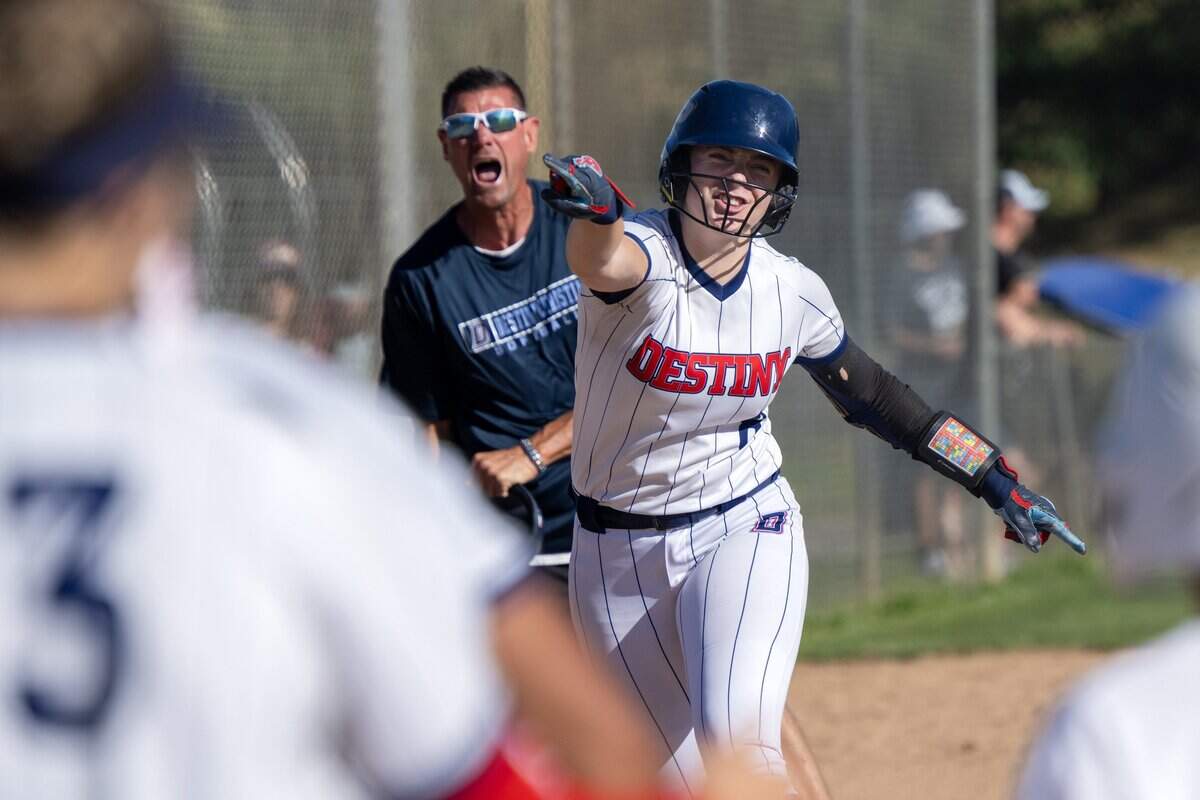 The Destiny Christian Academy Lions' Roxanne Sardo rounds third base after hitting a two-run home run in the bottom of the fifth inning against the Whitney Wildcats in the CIF NorCal Division I championship softball game on Saturday in Rosemont.