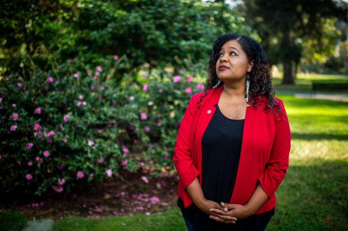 Jeanine Gaines, who works at Sacramento Native American Health Center, says a legacy of redlining of exacerbated inequities in the city. “Why should people have to try so hard to have a good life, because you live on this side of Meadowview versus living this side of Pocket?” she said. Gaines stands for a portrait in Capitol Park in downtown Sacramento on Wednesday, Oct. 7, 2020.