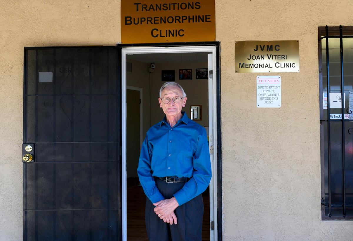 Dr. Neil Flynn stands at the entrance to the Transitions Buprenorphine Clinic on Aug. 23, 2019. The small clinic in Oak Park is dedicated to treating people with opioid addictions.